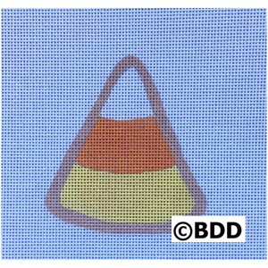 A candy corn bag on a blue background.