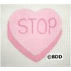 A pink heart with the word stop written on it.