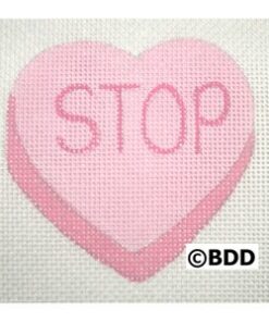 A pink heart with the word stop written on it.