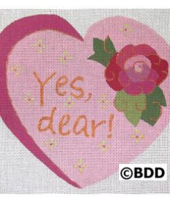 A heart with the words " yes dear !" written on it.