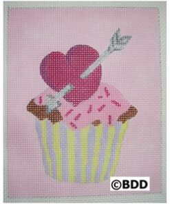 A pink cupcake with a heart and arrow on it.