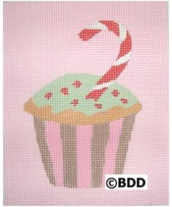 A cupcake with a candy cane on top of it.