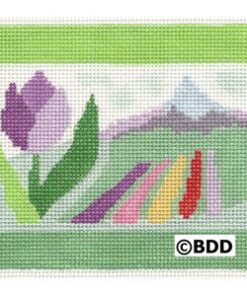 Tulip and colorful field with distant mountain