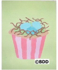 A pink striped bucket with a blue bird inside.