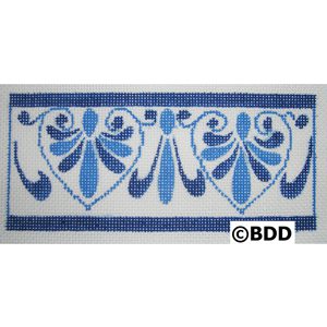 A blue and white border with a floral design.