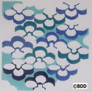 A blue and white pattern is shown on paper.