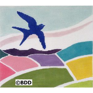 A blue bird flying over a colorful field.