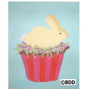 A painting of a bunny sitting on top of a cupcake.