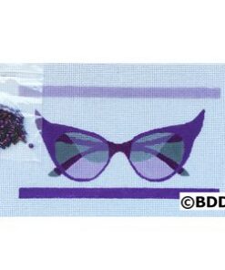 A purple pair of glasses sitting on top of a table.