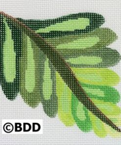 A green leaf with some brown lines on it
