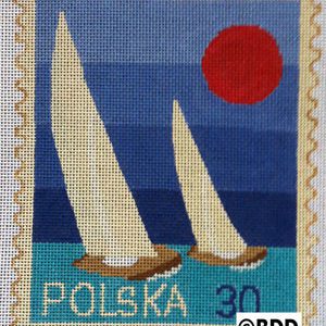 A cross stitch of two sailboats on the water.