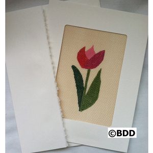 A card with a picture of a flower on it.