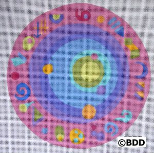 A pink and blue circle with various shapes on it.