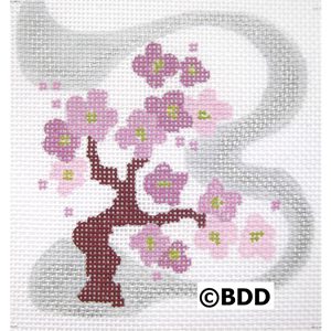 A cross stitch pattern of the letter b with flowers.