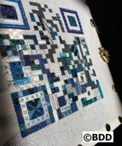 A close up of the qr code on a book