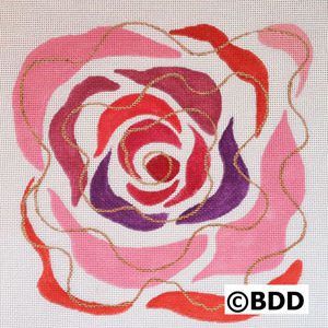 A rose with gold chain and pink, purple and red.