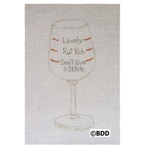 A wine glass with the words " lovely but red don 't give a stitch ".