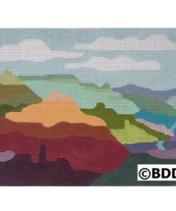 Colorful layered canyon landscape with pale clouds