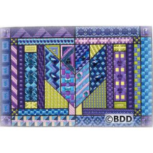 A purple and blue patterned card with the letters d, e, f.