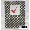 A black and white checkered card with a red check mark.