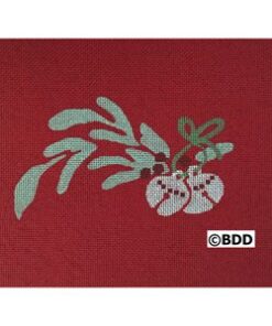 A red cloth with a plant and two white flowers.
