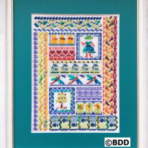 A framed picture of a quilt with various designs.