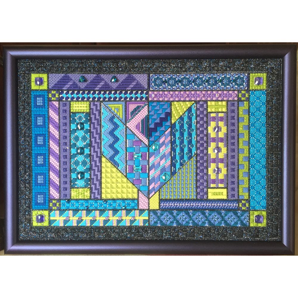 A painting of a heart with blue and yellow designs.