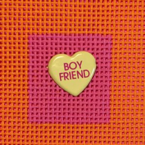 A yellow heart with the words " boy friend " on it.