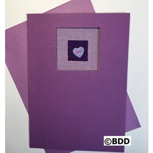 A purple card with a heart on it.