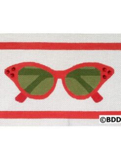 A red pair of sunglasses with green lenses.
