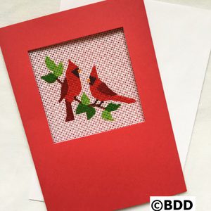 A red card with two birds on it