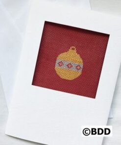 A red and yellow christmas ornament is in the frame.
