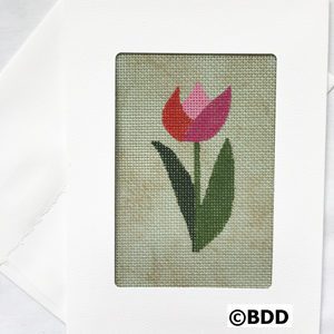 A card with a picture of a flower on it.