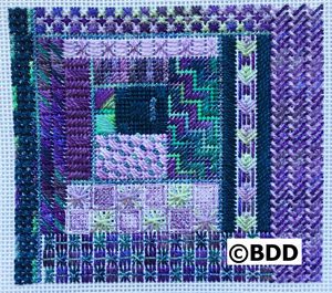 A purple and green square with some designs on it