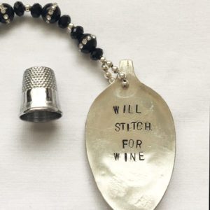 A spoon with the words " will stitch for wine ".