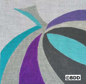 A close up of the fabric with purple, blue and grey designs.