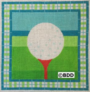 Golf ball on red tee with plaid border