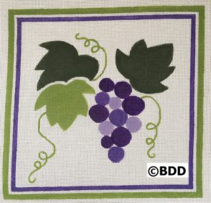 Needlepoint grape cluster with green leaves