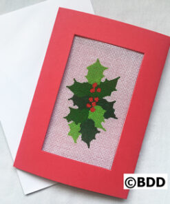 A red frame with a picture of a holly leaf.