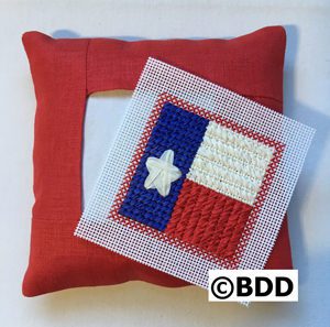 A red pillow with a white star on it