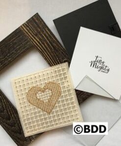 A picture frame with some cards and a card holder