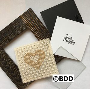 A picture frame with some cards and a card holder