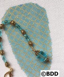 A blue bead necklace with gold beads and a glass bead.