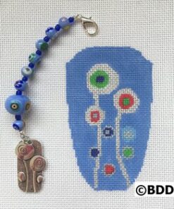 A blue bead and a piece of art