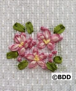 Small pink ribbon flowers on white woven fabric