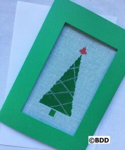 A green frame with a christmas tree on it.