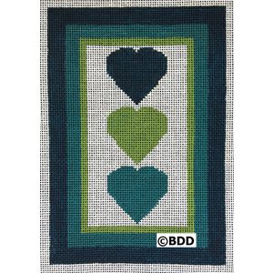 A cross stitch pattern of three hearts in the middle.