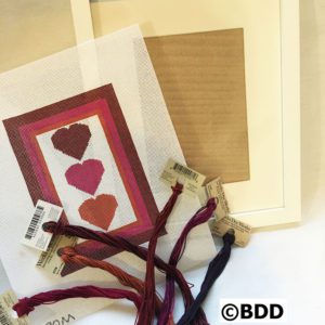 A close up of some red hearts on a card