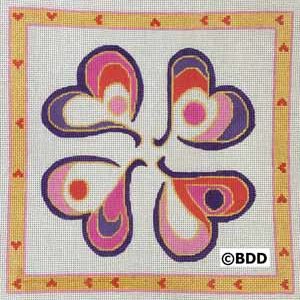 A colorful butterfly design with hearts around it.