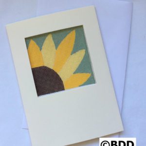 A card with a sunflower cut out of it.